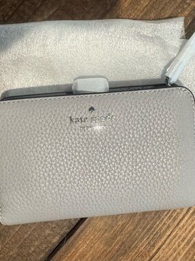kate spade gray pebbled leather zip wristlet wallet